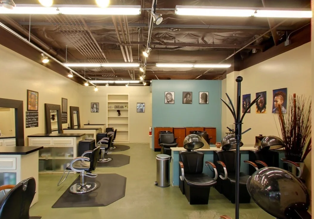 Wide view of the Good Hair Salon interior and styling stations